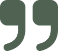 Close-up of green quotation marks